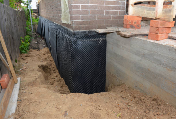 Happy homeowners after waterproofing job in Union